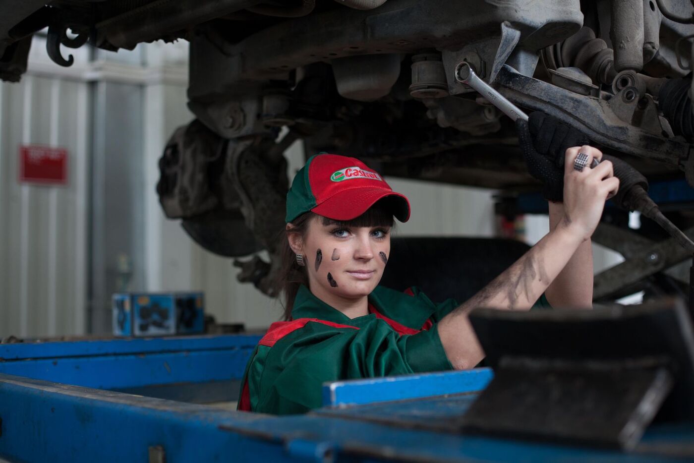 Mechanic working beneath a vehicle